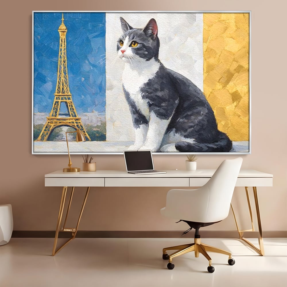 Tablou canvas cu tablou canvas cu pisica si turnul eiffel, in rama de aluminiu argintiu, pe perete intr-un birou